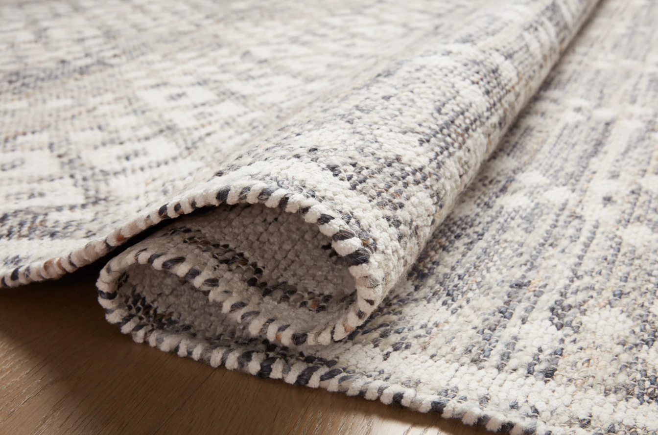 Angela Rose Rivers Rug in Denim/Ivory: Folded Product View