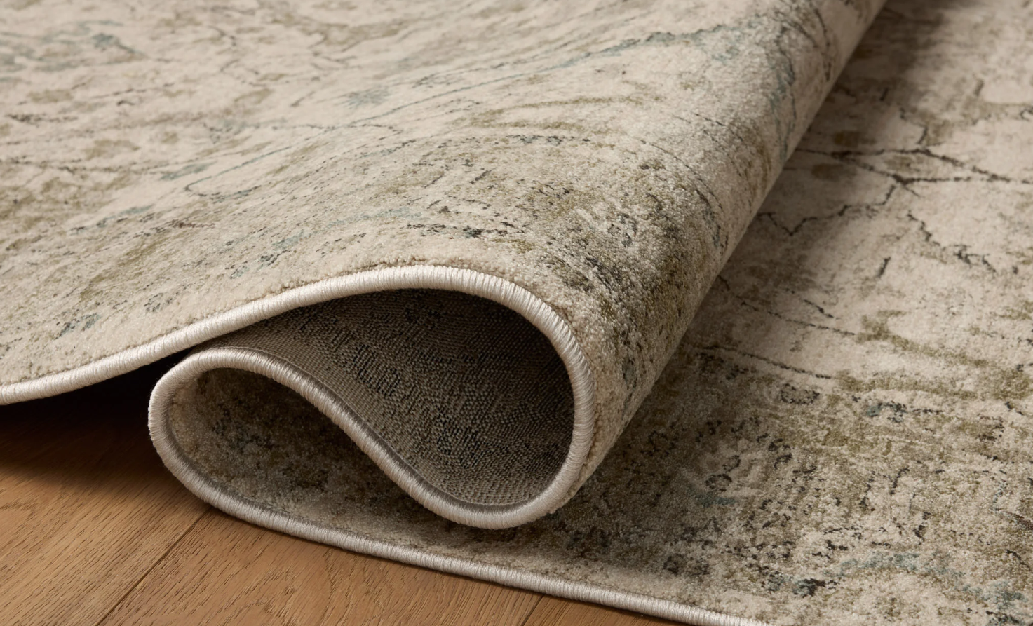Briar Rug in Ivory/Sage: Folded Product View