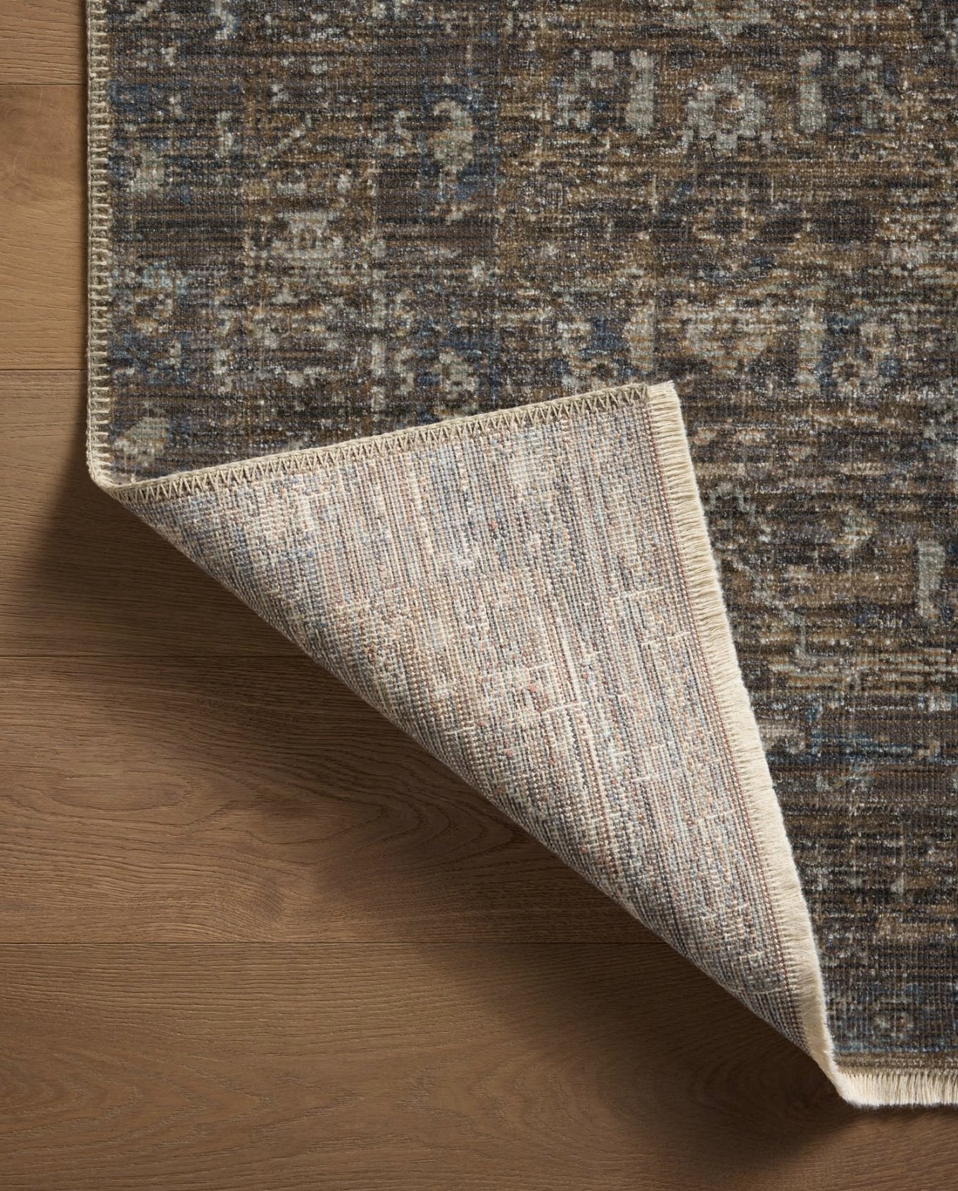 Heritage Rug in Lagoon/Tobacco: Backing View