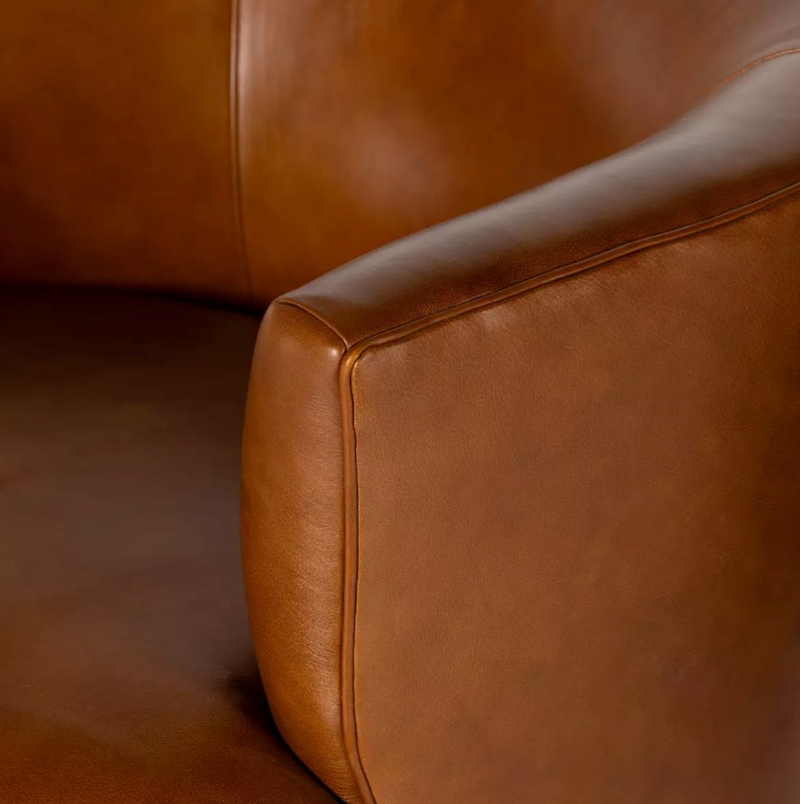 Mila Swivel Chair in Rivera Cognac: Armrest View