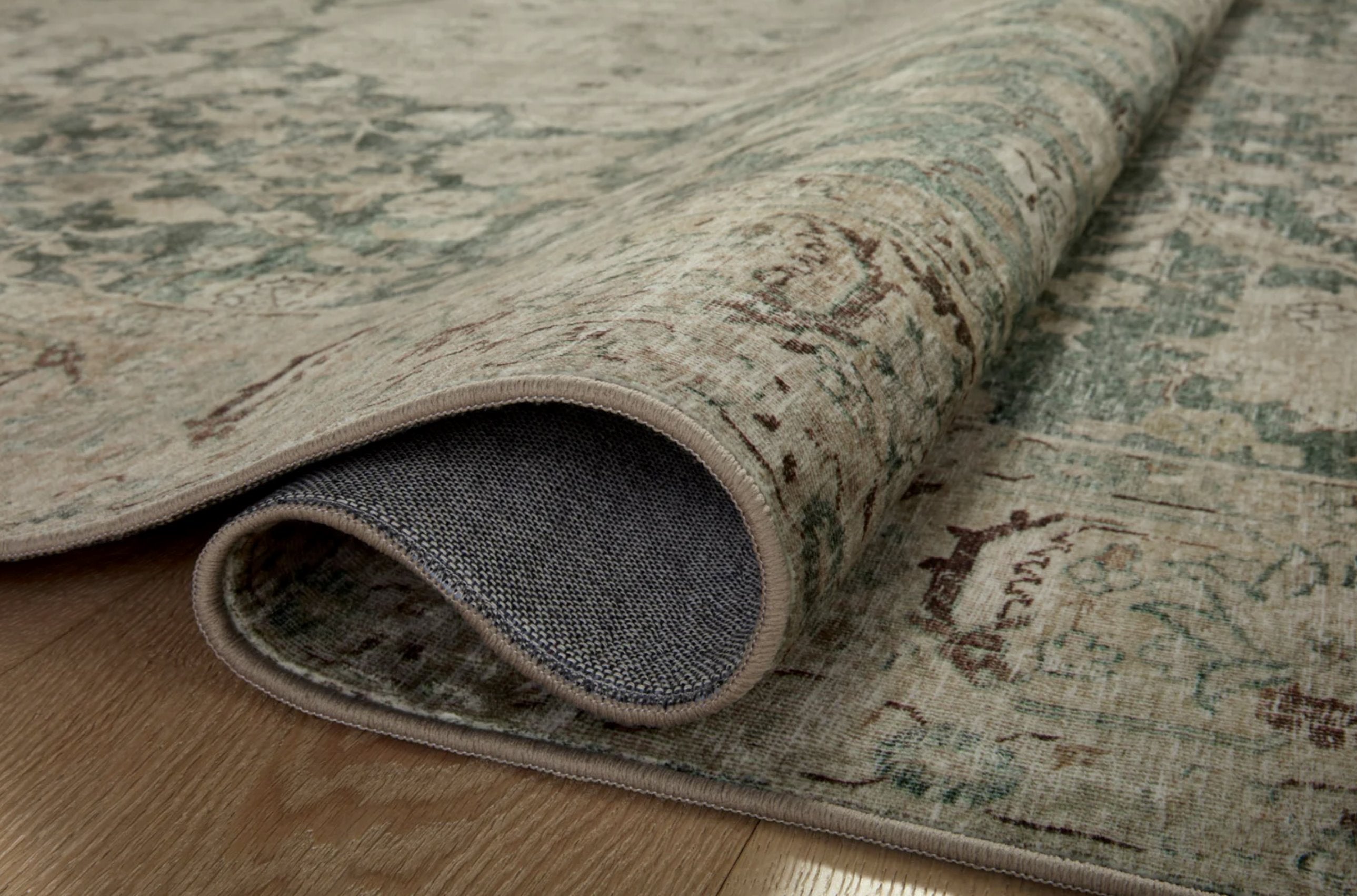 Sinclair Rug in Jade/Sand: Folded View