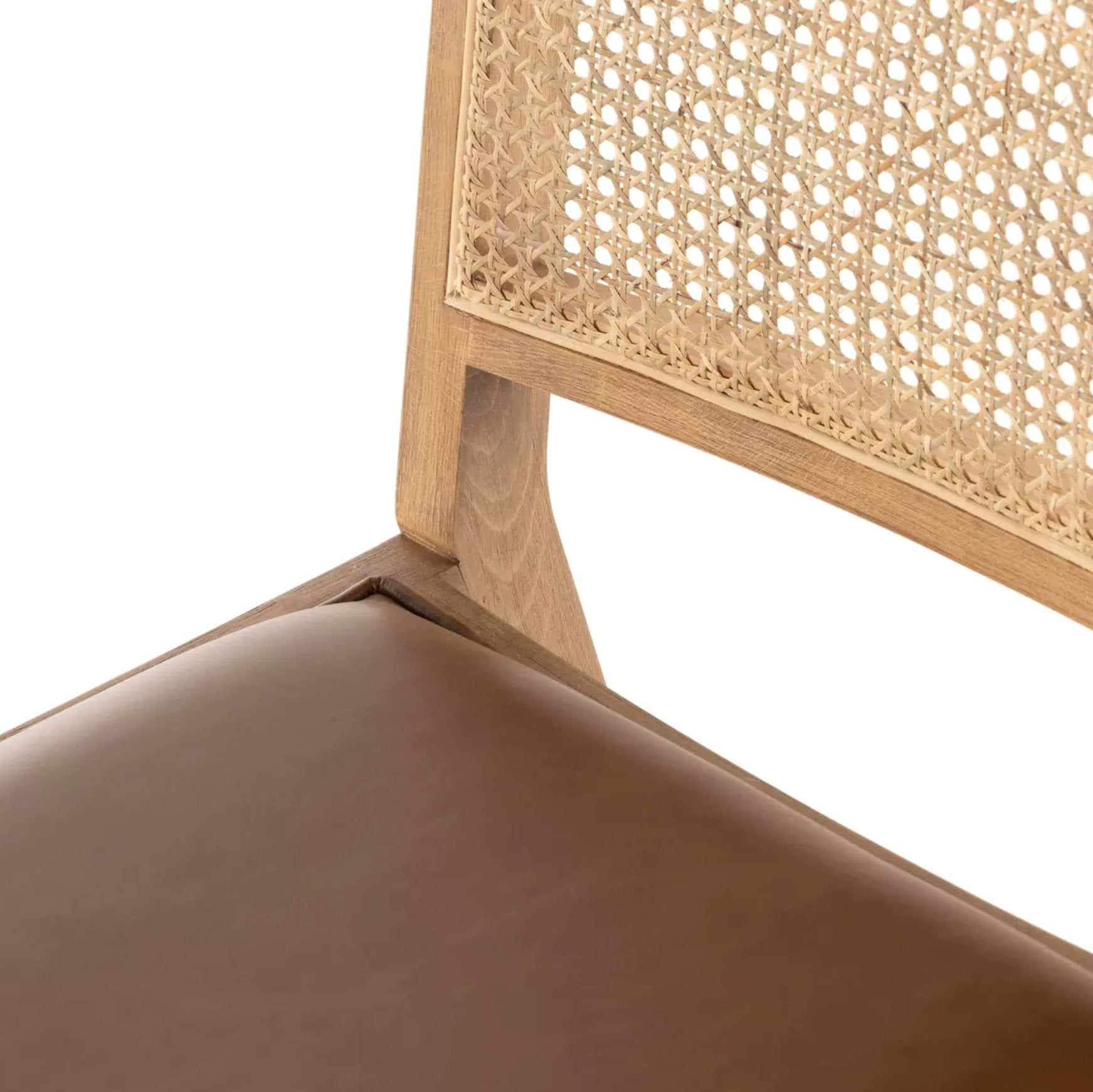 Sage Dining Chair: Up-Close View of Leather Seat and Natural Cane Back