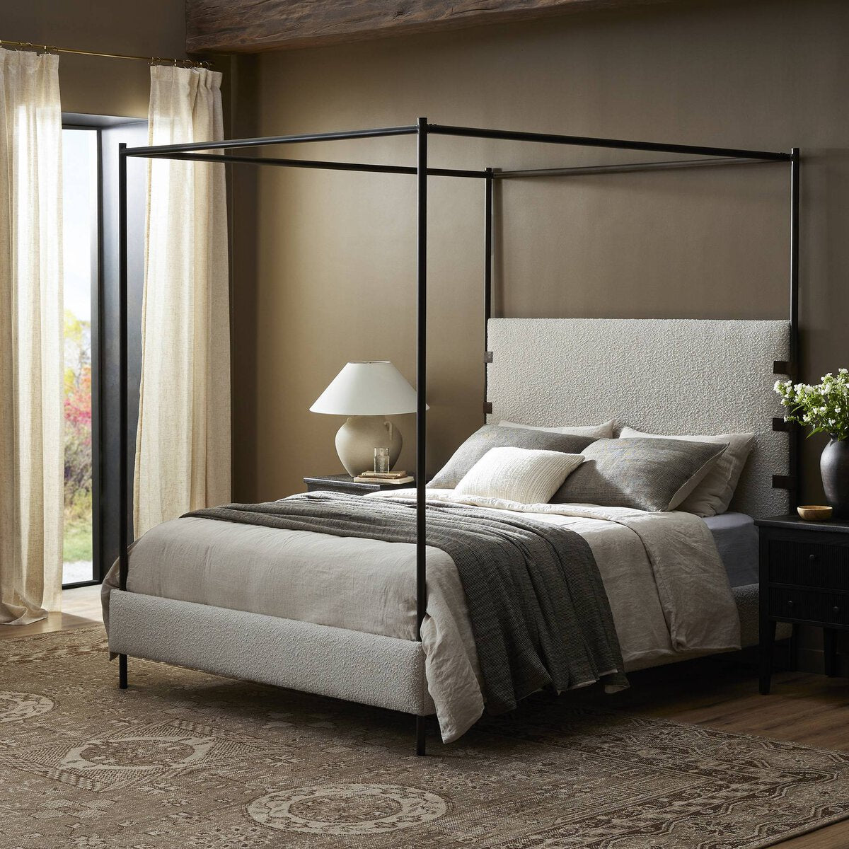 Anderson Canopy Bed - styled with an ornate rug and neutral bedding