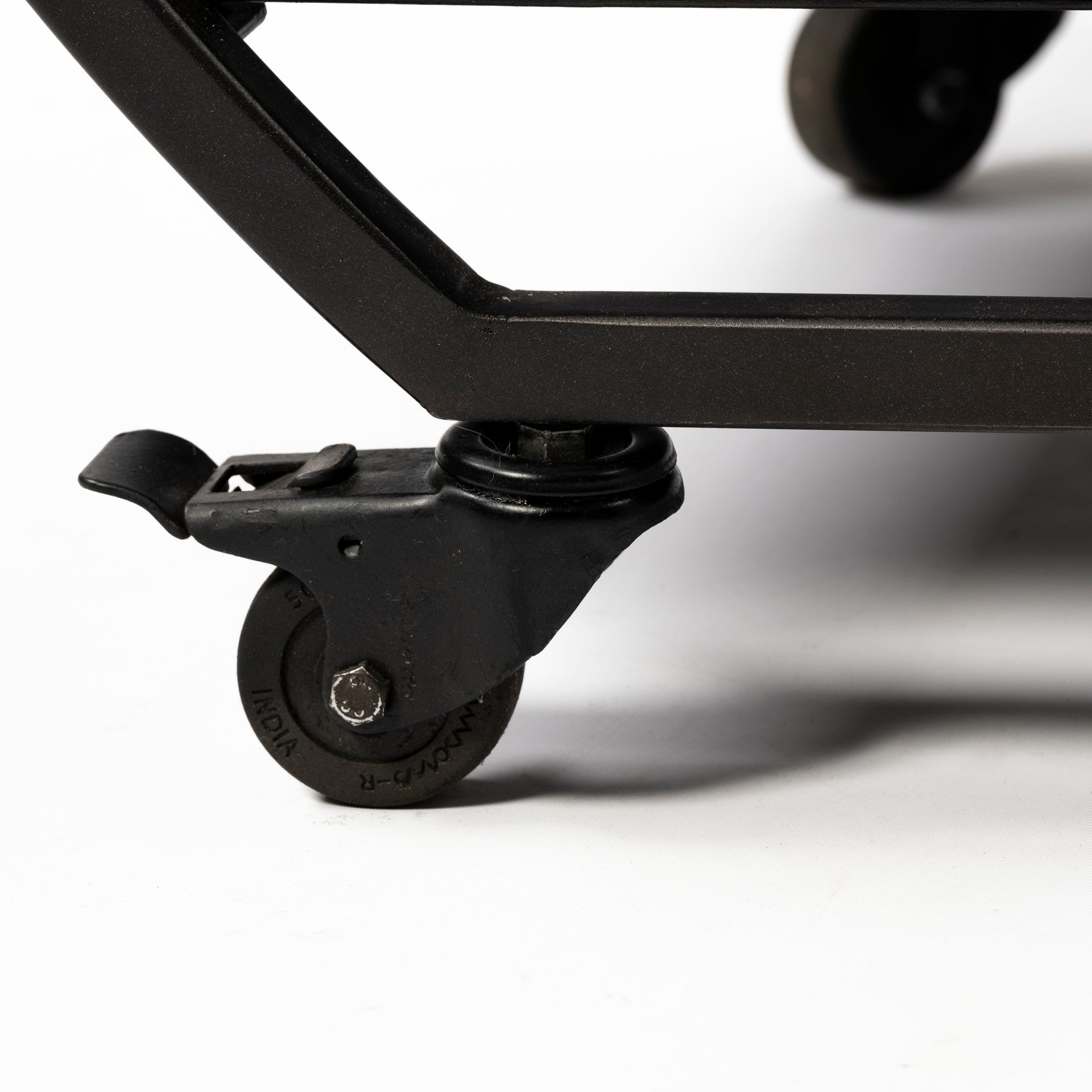 Chriselle Bar Cart - detail view of locking wheels