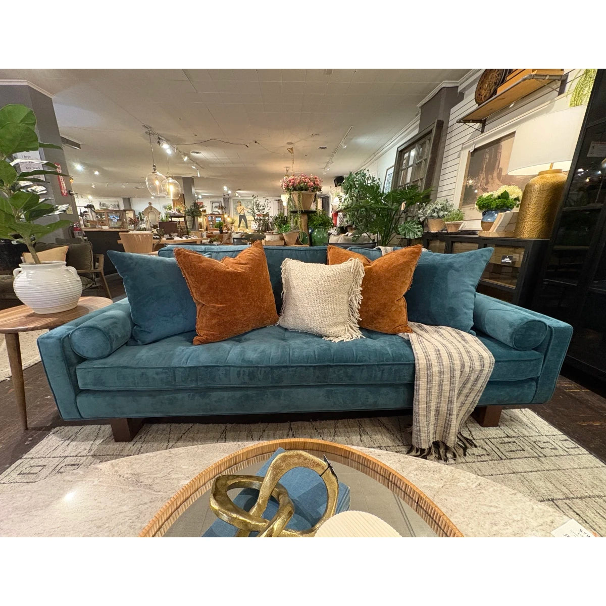 Bennett Sofa in Teal - shown in a City Home showroom
