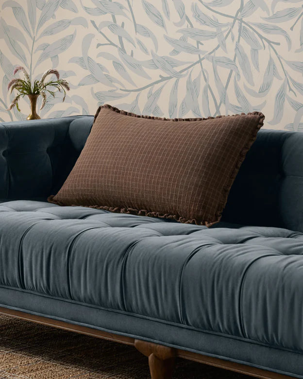Dinah Pillow in chocolate - styled on a velvet sofa