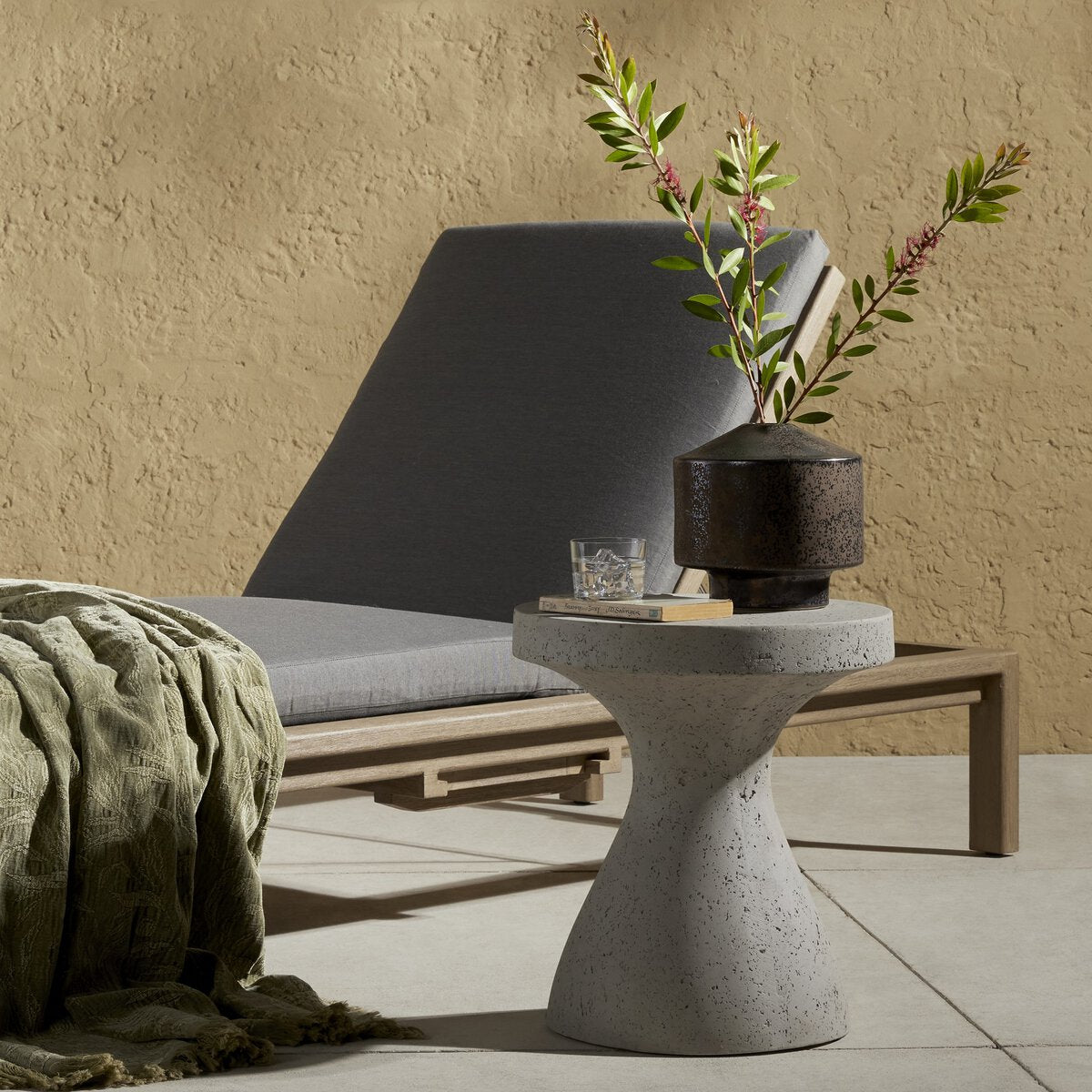 Koda Outdoor End Table - styled with a plant and drink