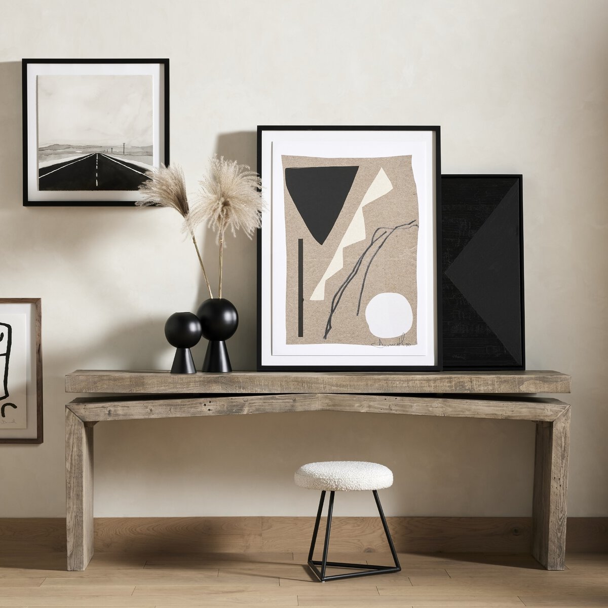 Matthes Console Table - weathered wheat, styled with neutral artwork
