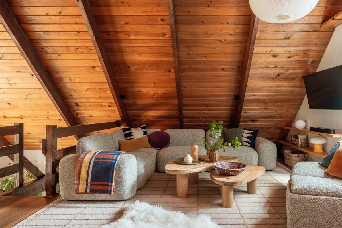 Pacifica 8 Piece Sectional - shown styled in a cabin