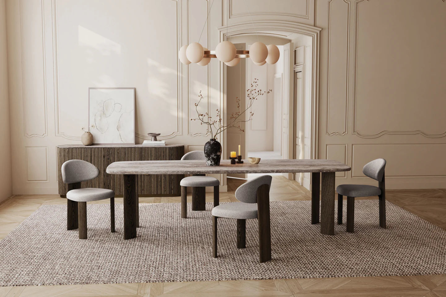 Shoku Dining Table - styled in a warmly lit dining room