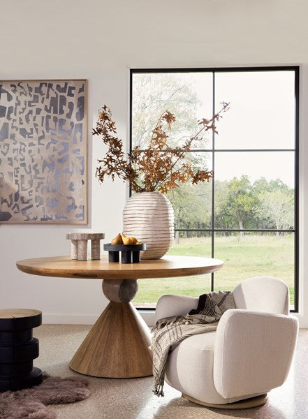 Inez end table in natural pine styled in a dining area