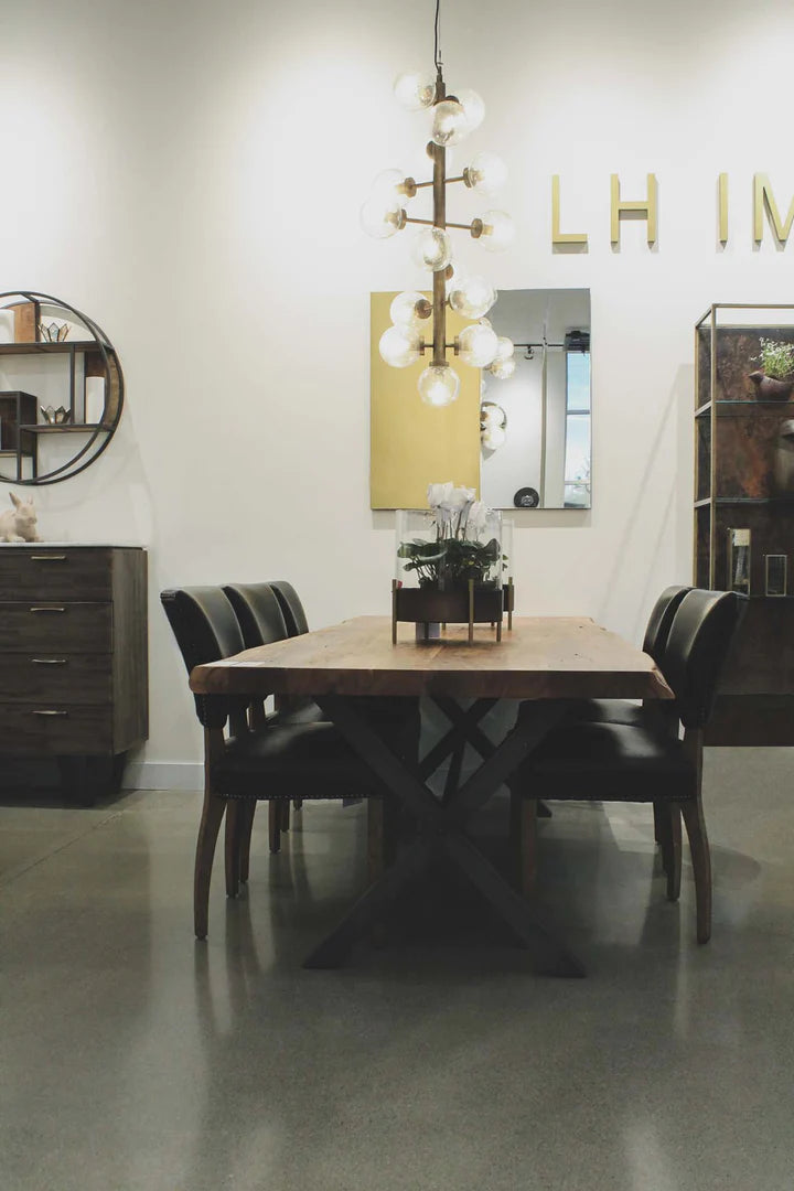 Restore Dining Table in Solid Acacia styled with black dining chairs
