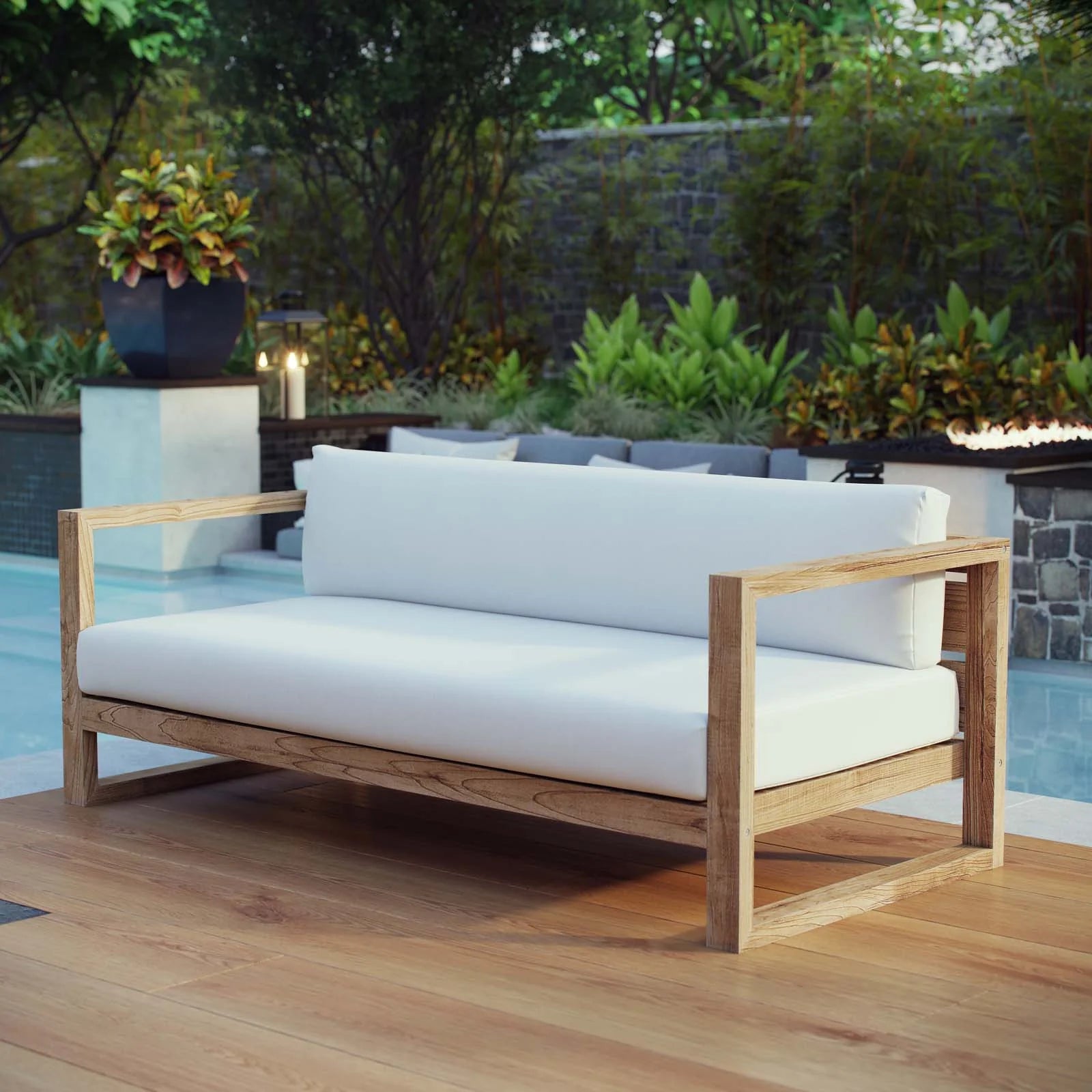 Upland Outdoor Patio Teak Sofa - styled outdoors near a pool