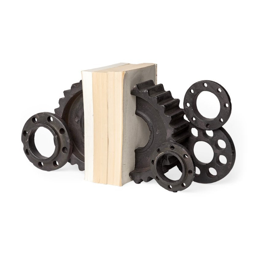 Cogsworth Bookends: The set of 2 Cogsworth Bookends gives the appearance of gears in a machine turning while holding-up your Charles Dickens novels. Perfect for an enthusiast of the industrial aesthetic.