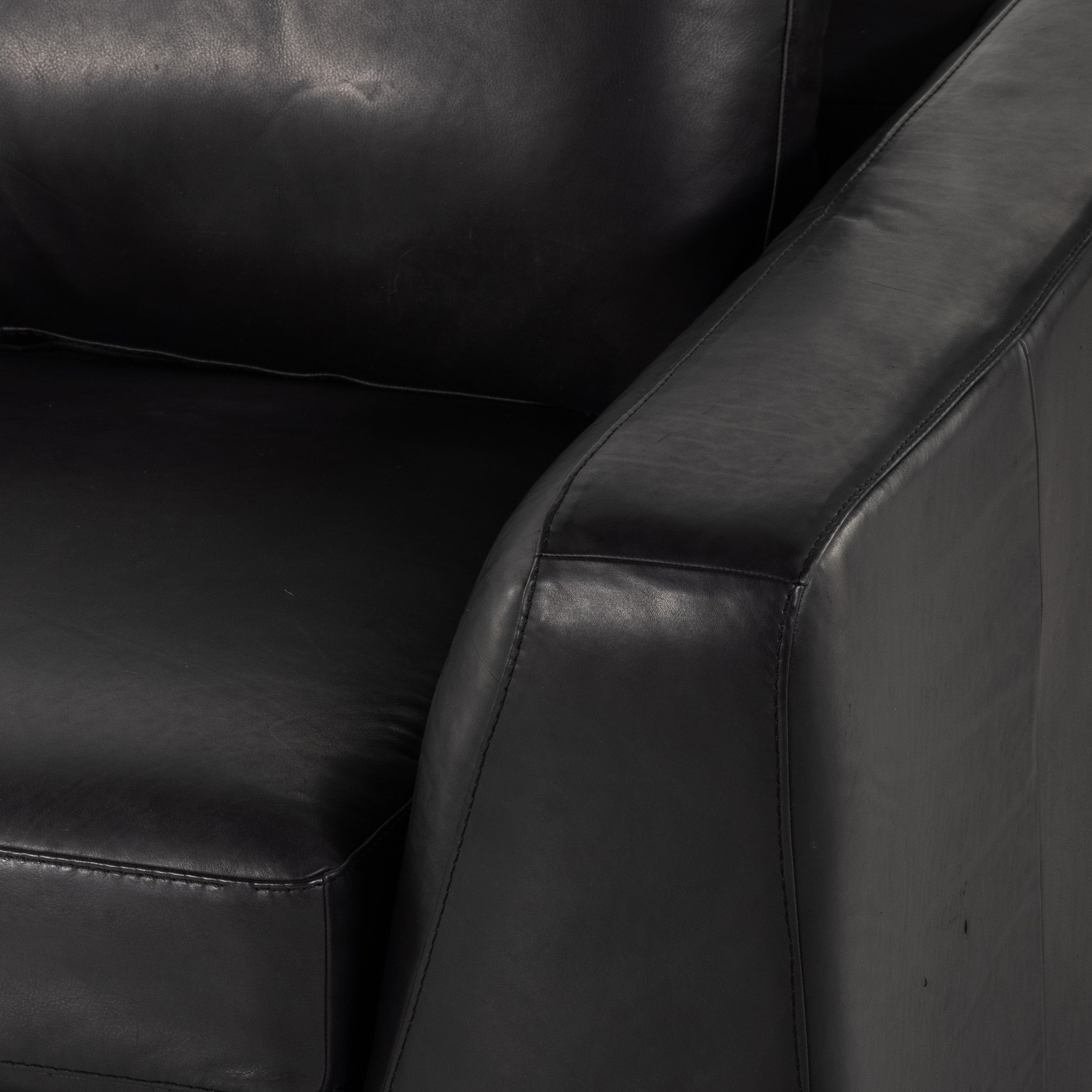 Colt Sectional in heirloom black leather detail