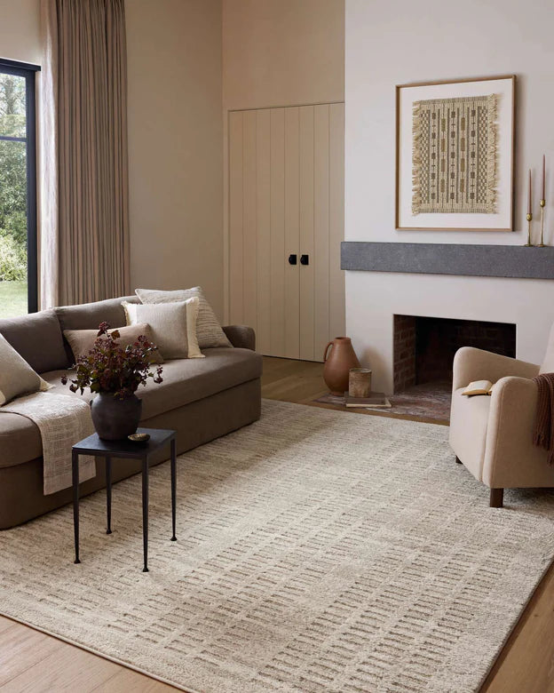 Monty rug - styled in a living room with a grey sofa