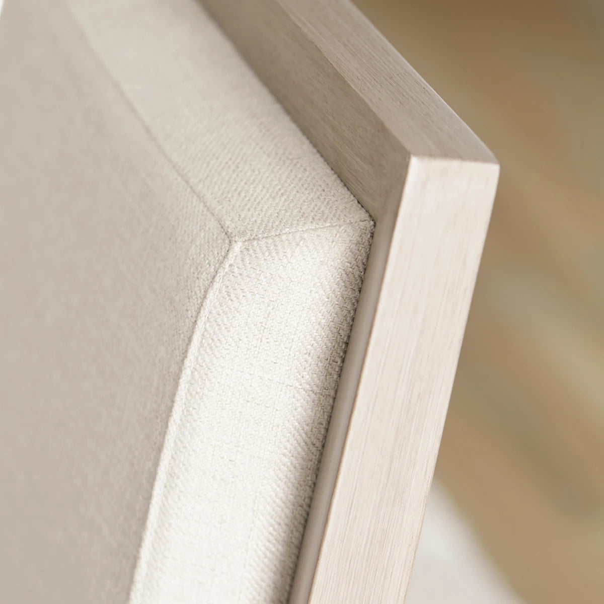 Axiom Arm Chair - detail view of upholstery and wood frame