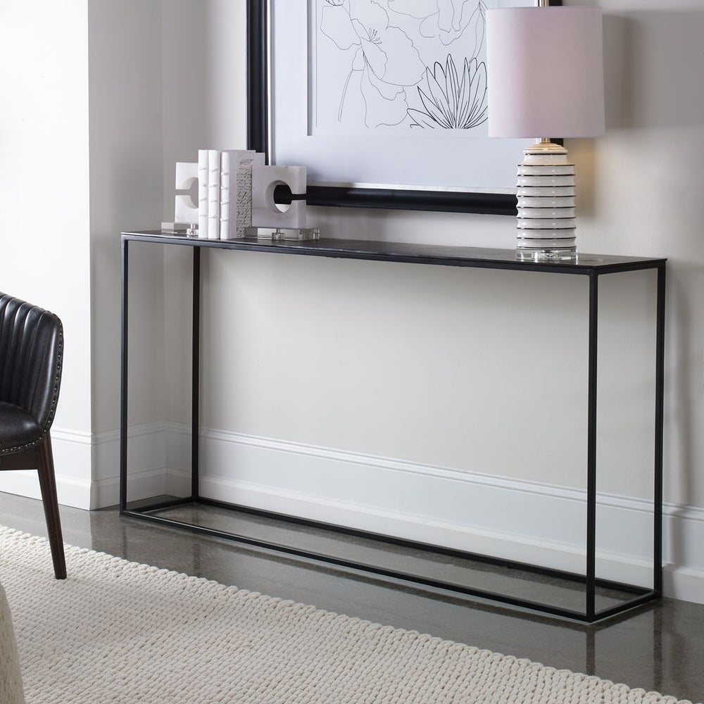 Coreene Console Table - styled with a lamp and black and white artwork
