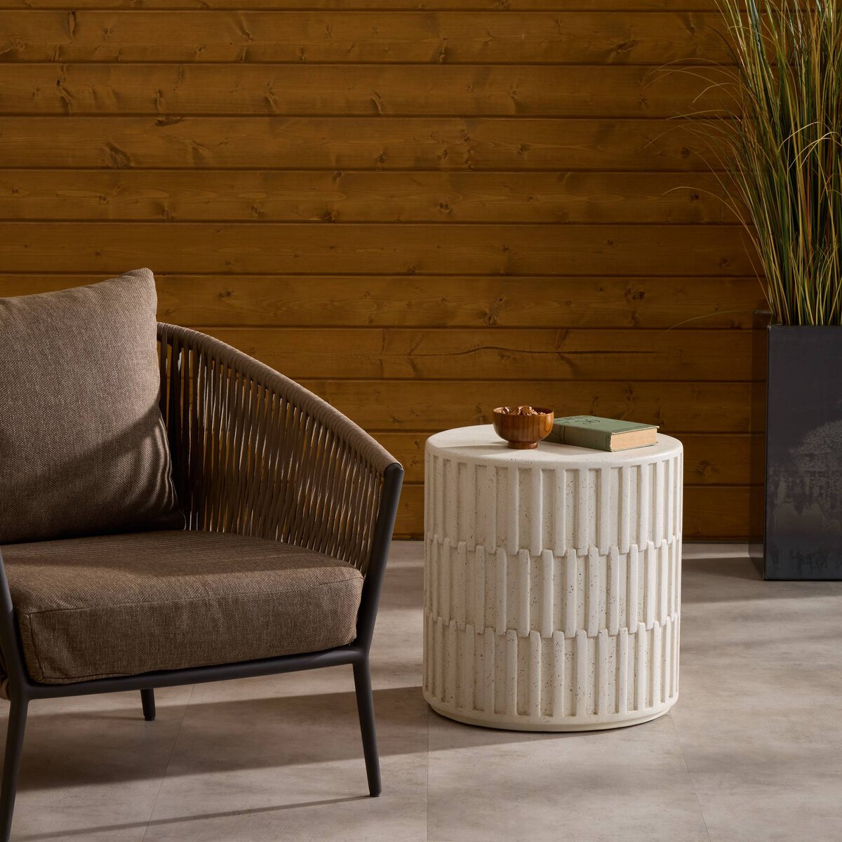 Callisto Outdoor End Table - styled with an outdoor chair