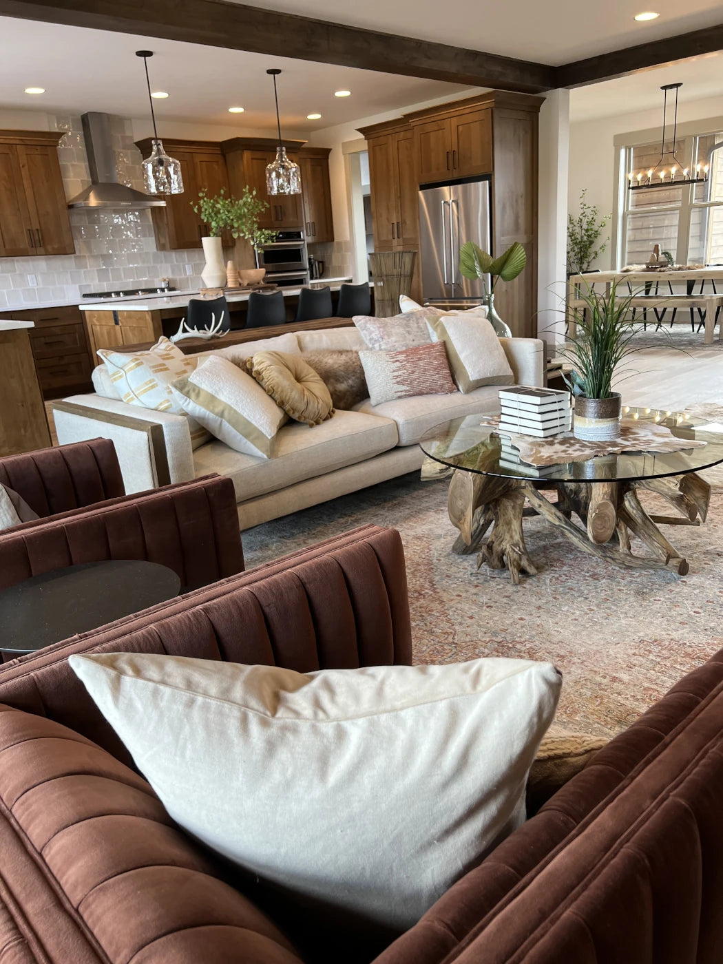 A living room featuring a Four Hands sofa and chairs from City Home furniture showroom in Bend.