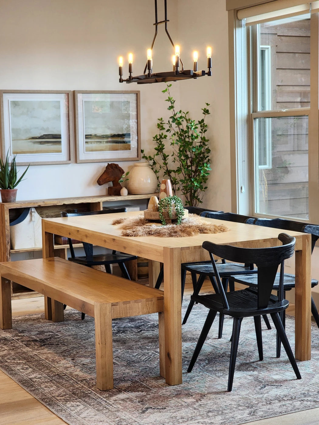 Dining room featuring a table and chairs from Four Hands, available at City Home in Portland.