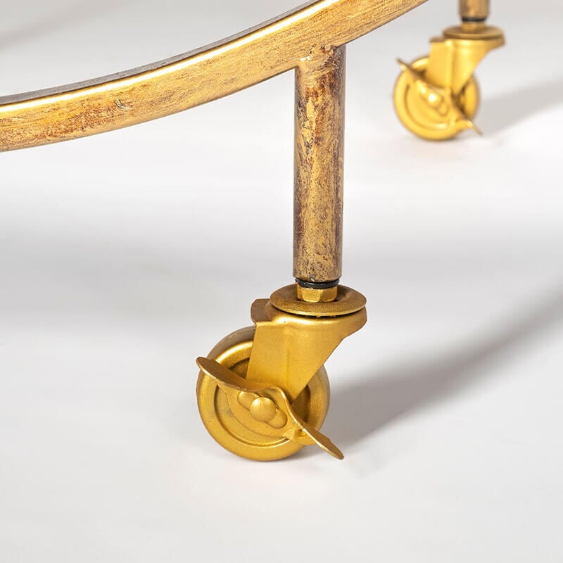 Carola Bar Cart - detail view of rolling caster feet