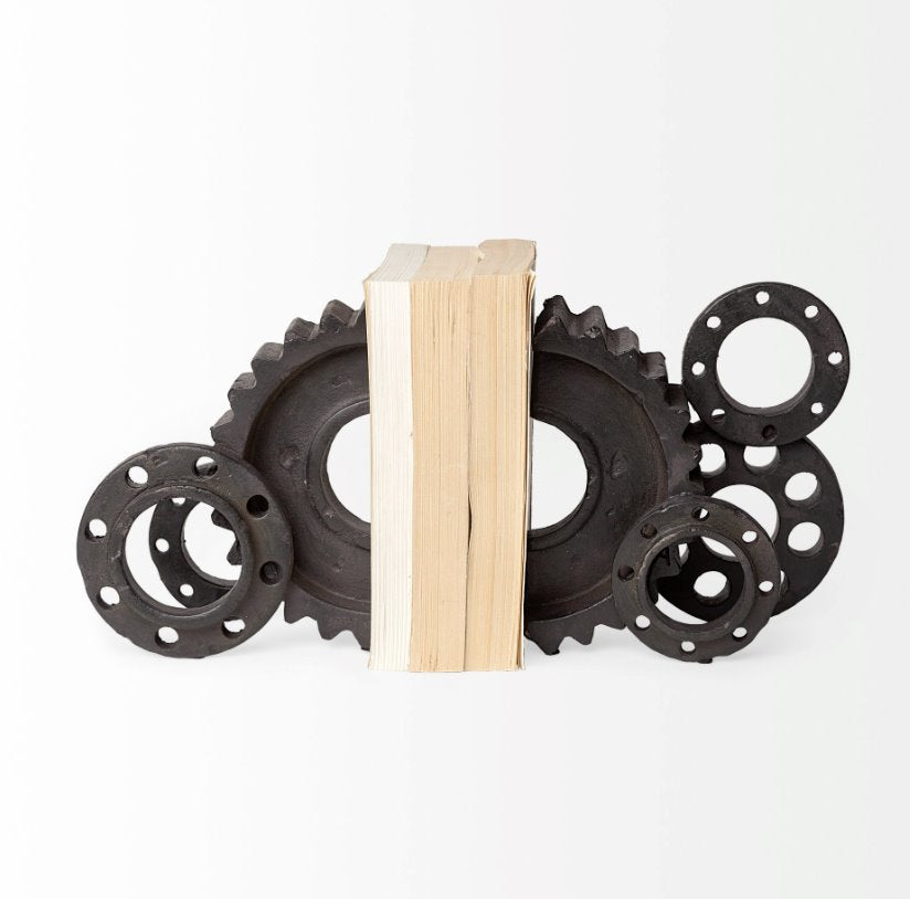 Cogsworth Bookends: The set of 2 Cogsworth Bookends gives the appearance of gears in a machine turning while holding-up your Charles Dickens novels. Perfect for an enthusiast of the industrial aesthetic.