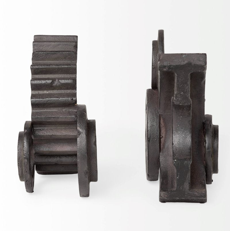 Cogsworth Bookends: The set of 2 Cogsworth Bookends gives the appearance of gears in a machine turning while holding-up your Charles Dickens novels. Perfect for an enthusiast of the industrial aesthetic.