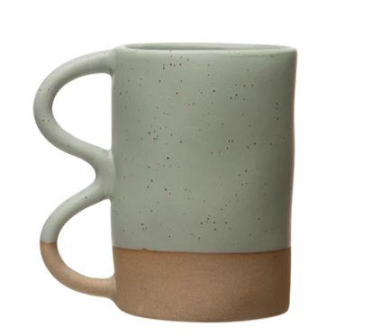 Matte Speckled Stoneware Squiggle Handle Mug: Functionality meets aesthetic with these beautiful stoneware mugs. The matte color scheme with the subtle specks and the squiggle handle makes these mugs a must-have in the kitchen.