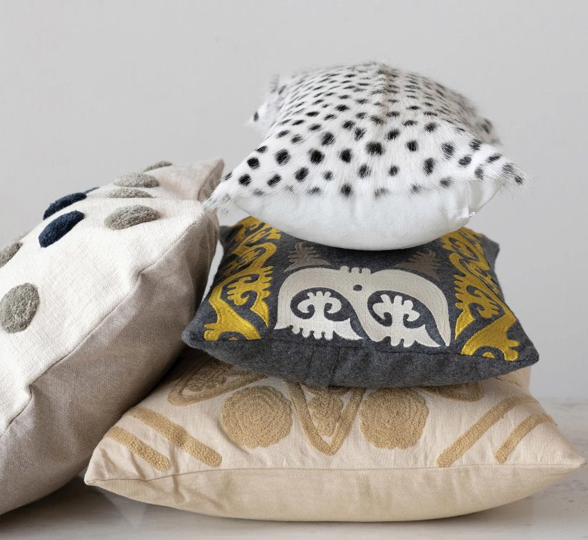 20" x 12" Goat Fur Lumbar Pillow w/ Printed Spots:  Add the element of texture to your home with this lumbar fur pillow with a timeless black/white spotted print that goes with your ever-changing style. 