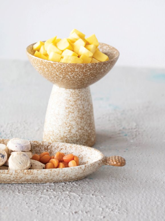 Speckled Reactive Glaze Stoneware Dish on Pedestal:  Stoneware is the ideal material for holding food which makes this dish on a pedestal a stylish way to display food or bits and bobs. With the reactive glaze each one will vary in unique finishes.